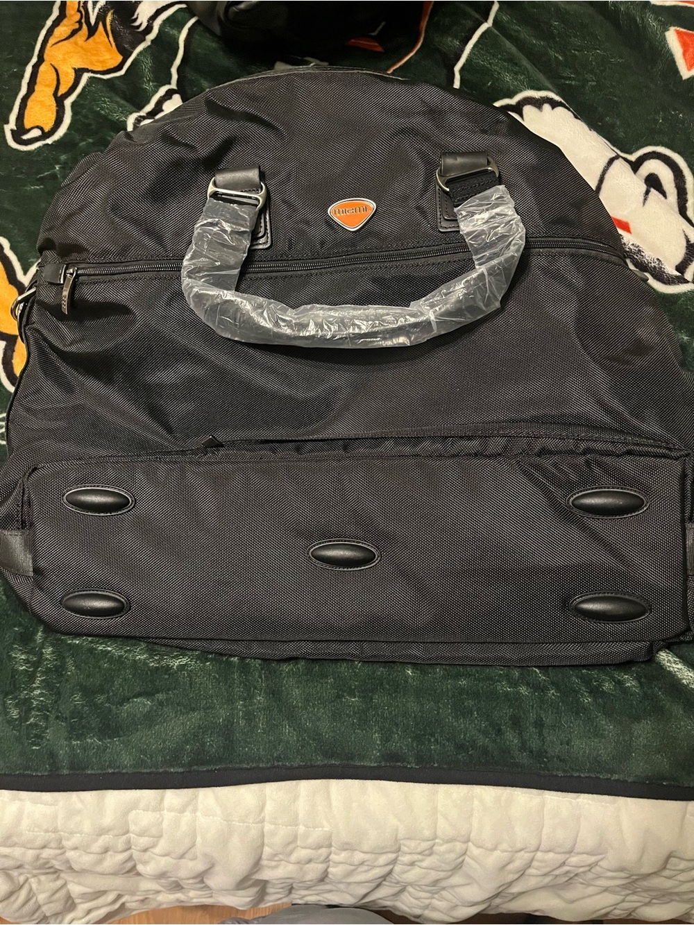Durable Black Travel Bag with handles. Official Miami Hurricanes Travel